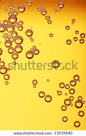 lots of bubbles floating in a drink