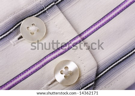 close-up of a cotton shirt cuff ,showing texture to the fabric