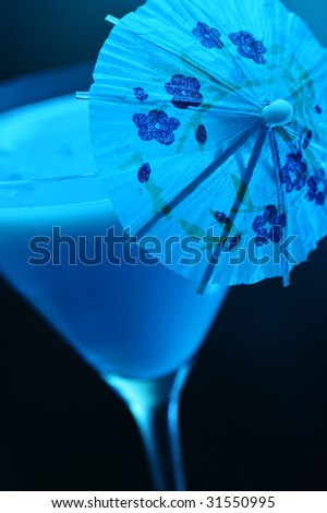 Hawaiian Blue cocktail. white rum,curacao, pineapple juice, coconut milk and ice.