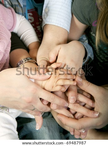 Multiple hands of a family
