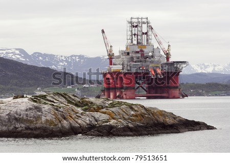 Oil rig in norwegian fjord  landscape