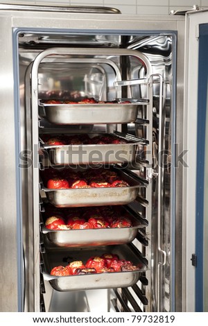 stuffed peppers in an industrial convection oven