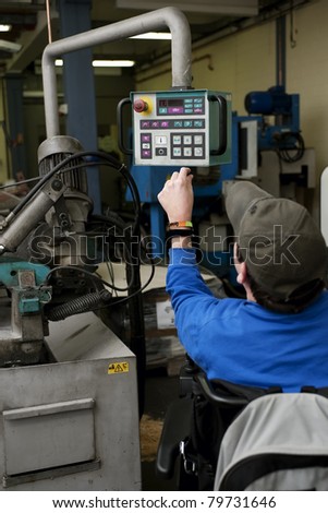 Man with disability operated an industrial machine