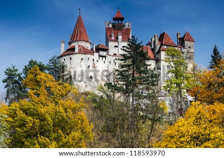 The medieval Castle of Bran guarded in the past the border between Wallachia and Transylvania. It is also known for the myth of Dracula. Autumn romanian landmark landcape.