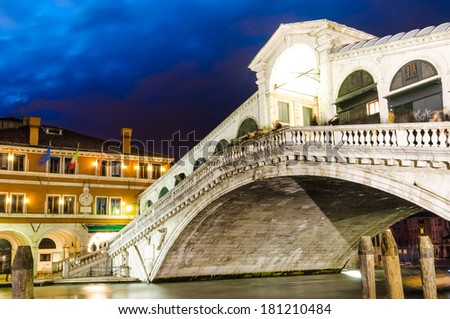 Venice, Italy. Rialto Bridge, Ponte di Rialto, famous touristic attraction in city, medieval architecture, twilight view.