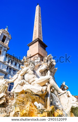 Rome, Italy. The famous Fountain of the Four Rivers with Egyptian obelisk in the middle of Piazza Navona in Roma, italian landmark.