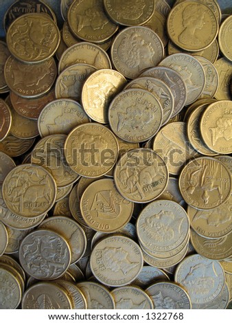 Lots of one dollar Australian coins.