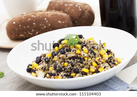 Vegan meal of mixed quinoa with corn and black beans.