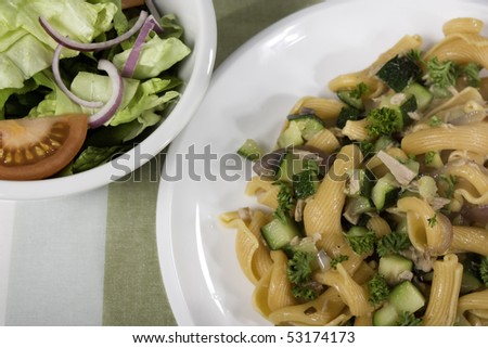 Pasta dinner with side salad