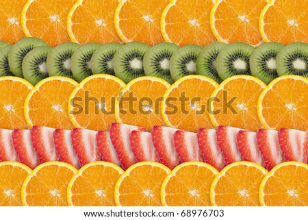 Fresh and refreshing fruit slices: oranges, strawberries and kiwi.