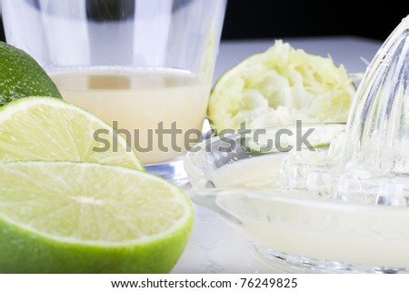 Lime halves, juiced limes and lime juice.