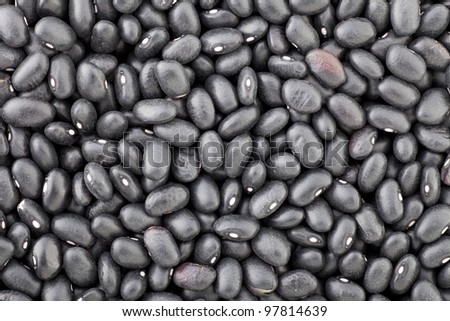 Dried black beans full frame for food background or texture.