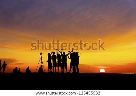 great sunset with silhouette people