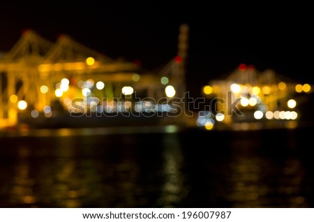 Container port background on dark, out of Focus Lights during the Night