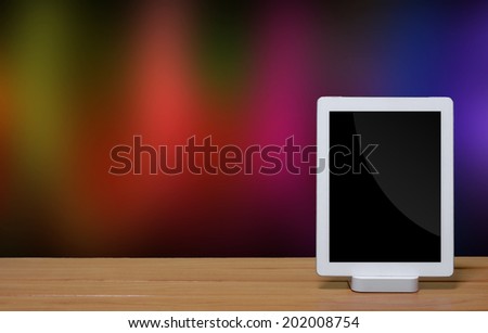 tablet pc computer with dock station on blur background.