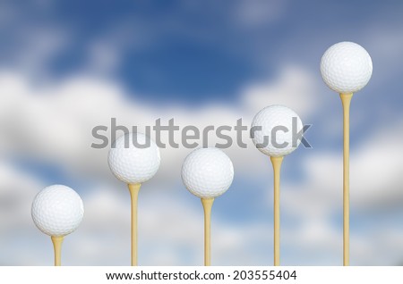 five golf ball on tee, sky blur background
