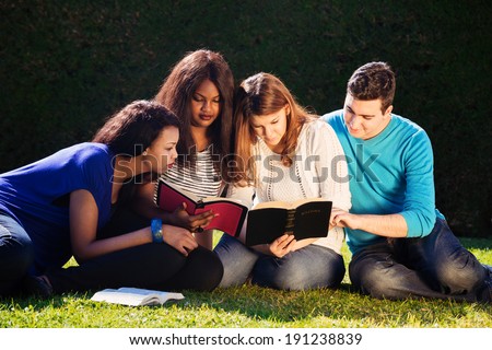 Group of Young people Studying the Bible together