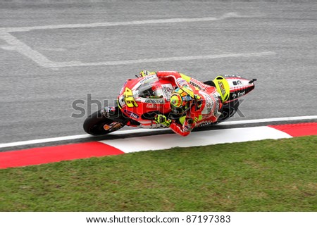 SEPANG,MALAYSIA-OCT. 21:Valentino Rossi of Ducati Team in action during practice session of Shell Advance Malaysian Moto GrandPrix on Oct. 21  2011 in Sepang, Malaysia.