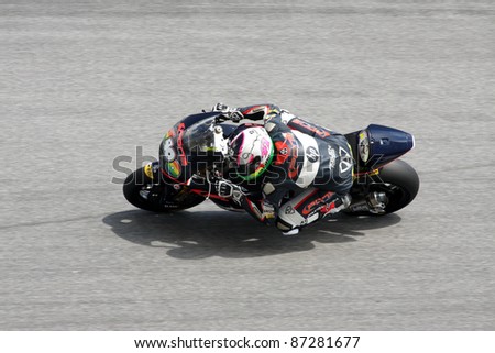 SEPANG,MALAYSIA-OCT.21:Aleix Espargaro of Pon HP 40 Team in action during practice session of Shell Advance Malaysian Moto GrandPrix on Oct. 21 2011 in Sepang, Malaysia
