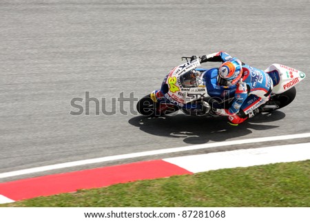 SEPANG,MALAYSIA-OCT.21:Esteve Rabat of  Blusens-STX Team in action during practice session of Shell Advance Malaysian Moto GrandPrix on Oct. 21 2011 in Sepang, Malaysia.