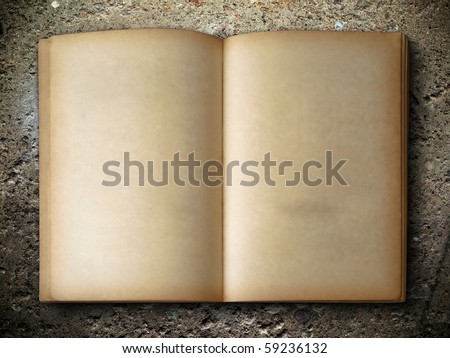 open old book two face on rock background