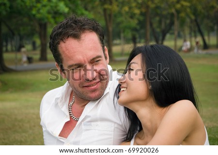 One couple talked happy in the park