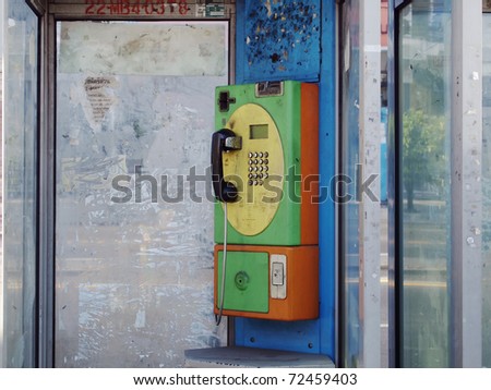 Old public telephone Coin orange and green color