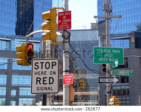 Way too many signs at an intersection in New York City