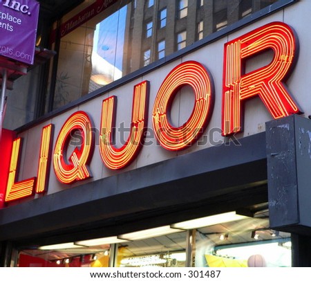 Neon Liquor sign in front of Store