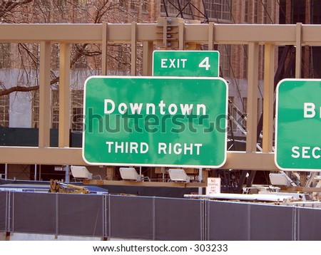 Manhattan Sign Series - Downtown. A sign directs traffic to Downtown Manhattan, New York City