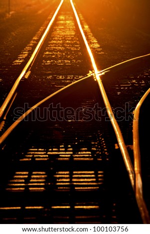 Morning sun lighting up railroad tracks