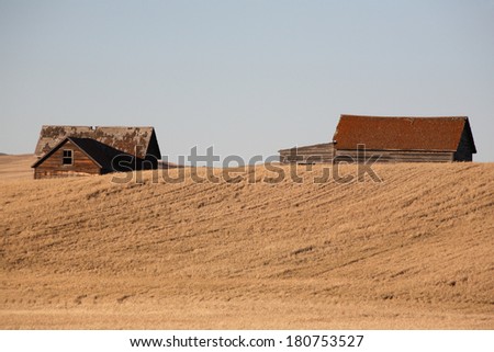 Old farm buildings on the Prairie