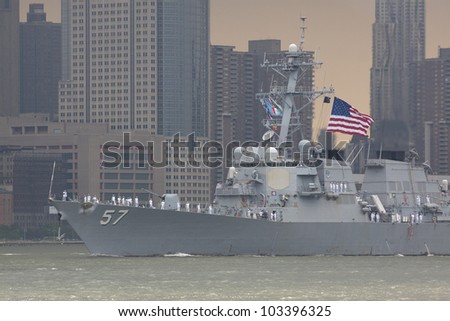 HOBOKEN, NJ  MAY 23: The warship USS Mitscher (DDG 57) sails on the Hudson River past Manhattan during the Parade of Sail on May 23, 2012 in Hoboken, NJ. The parade is the start of Fleet Week.