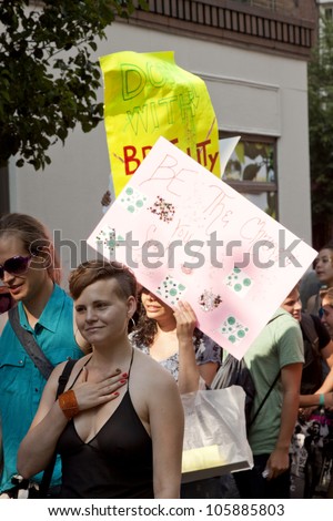 NEW YORK - JUNE 22: Supporters carry signs with messages that include \