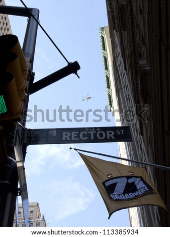 NEW YORK - SEPT 17: A helicopter hovers above Rector St and Broadway during the 1yr anniversary of the Occupy Wall St protests on September 17, 2012 in New York City, NY.