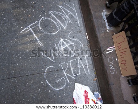 NEW YORK - SEPT 17:  \'Today Was Great\' is written in chalk on the sidewalk outside of Trinity Church on the 1yr anniversary of the Occupy Wall St protests on September 17, 2012 in New York City, NY.