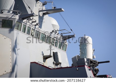 STATEN ISLAND, NY - MAY 25, 2014: The windows of the bridge on the guided-missile destroyer USS McFaul (DDG 074) docked at Sullivans Piers during Fleet Week NY on May 25, 2014.