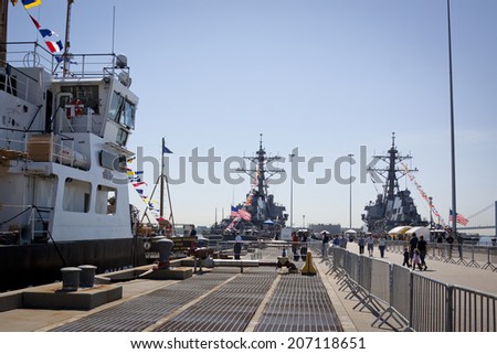 STATEN ISLAND, NY - MAY 25, 2014: A view down Sullivans Piers of the USCGC Katherine Walker (WLM 552), USS Cole (DDG 67), and USS McFaul (DDG 74) moored in Staten Island during Fleet Week NY.