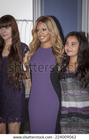 NEW YORK - OCT 16, 2014: Laverne Cox, actress in \'Orange Is The New Black\' and cast members from her documentary \'The T Word\' on the observation deck of the Empire State Building.