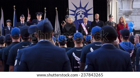 NEW YORK - NOV 11, 2014: New recruits to the US Air Force are sworn in by Lt. Gen. Stephen L. Hoog during the 2014 America\'s Parade held on Veterans Day in New York City on November 11, 2014.