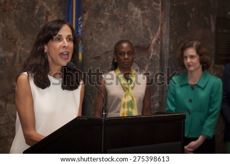 NEW YORK - MAY 5, 2015: hope & grace initiative board member and CMO of Coty Skincare, Jill Scalamandre speaks at the ceremony in honor of National Mental Health Month Empire State Building.