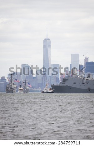 STATEN ISLAND, NY - MAY 20 2015: USS San Antonio (LPD 17) on the Hudson River near the Freedom Tower of One World Trade Center in Lower Manhattan during the Parade of Ships, which begins Fleet Week.