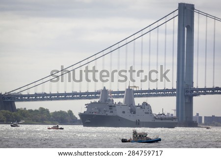 STATEN ISLAND, NY - MAY 20 2015: USS San Antonio (LPD 17) passes under the Verrazano-Narrows Bridge during the Parade of Ships, which begins Fleet Week.