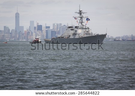 STATEN ISLAND, NY - MAY 20 2015: USS Stout (DDG 55) heads toward the Sullivans Pier in Staten Island on the Upper Bay after the Parade of Ships, which begins Fleet Week New York 2015.