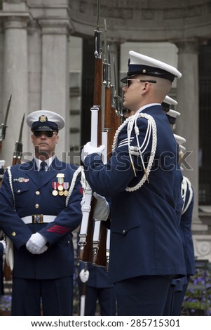 NEW YORK - MAY 21 2015: Members of the US Coast Guard Ceremonial Honor Guard Silent Drill Team perform next to the New York Public Library in Bryant Park during Fleet Week NY 2015.