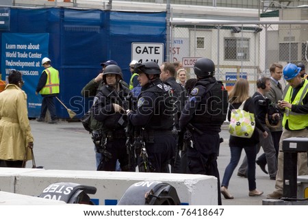 NEW YORK - MAY 2: Port Authority Police stand guard near the World Trade Center PATH train station on May 2, 2011 in New York City. Osama bin Laden was killed in Pakistan by US Seals the day before.