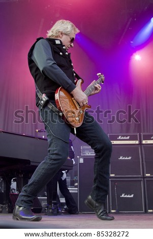 CLARK, NJ - SEPT 17: Guitar player Howard Leese performs with The Paul Rodgers Band at the Union County Music Fest on September 17, 2011 in Clark, NJ. Leese was also the guitarist for the band Heart.