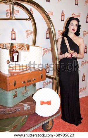 NEW YORK - NOV 15: Dita Von Teese launches “My Cointreau® Travel Essentials” vintage-inspired travel bar, at Forty Four|Royalton on November 15, 2011 in New York City, NY.