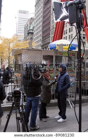 NEW YORK - NOV 17: Hip-hop mogul Russell Simmons gives a television news interview on the 'Day of Disruption' outside of Zuccotti Park on November 17, 2011 in New York City, NY.