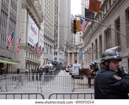 NEW YORK - NOV 17: Police temporarily clear the area at Broad Street and Exchange Place near the entrance to the NY Stock Exchange on the \'Day of Disruption\' on November 17, 2011 in New York City, NY.